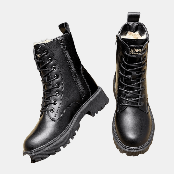 Black lace-up ankle boots with faux fur trim and treaded lug sole