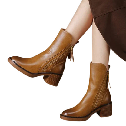 Brown platform ankle boots with side zipper, tassels, and stacked block heel