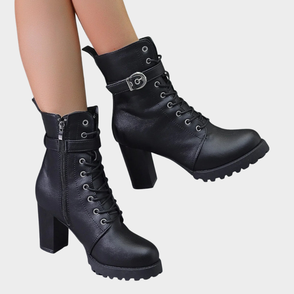 Black flared heel ankle boots with side zip, lace-up front, and buckle strap