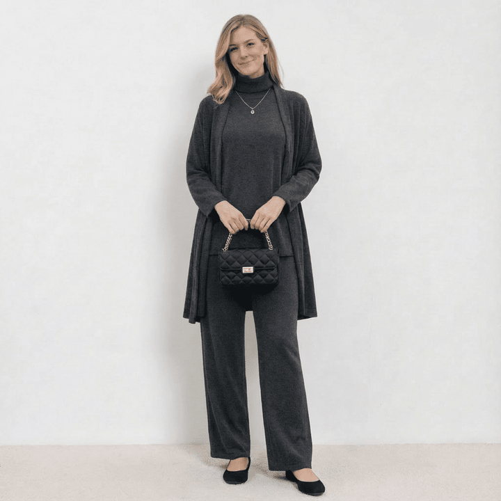 Dark grey knit cardigan, turtleneck top and wide-leg trousers set.
