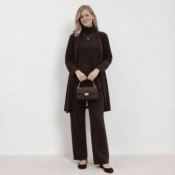 Dark brown knit cardigan, turtleneck top and wide-leg trousers set.