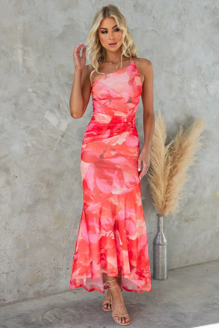 Pleated one-shoulder dress in bright pink with abstract floral print and ruched waist