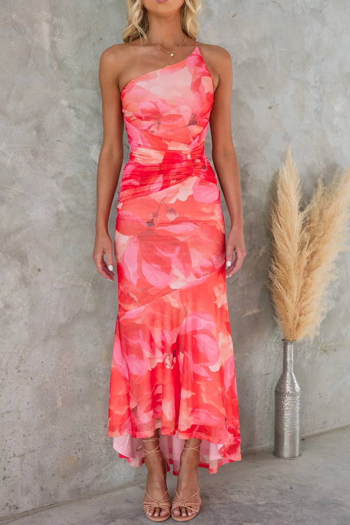 Pleated one-shoulder dress in coral red with floral print and ruched waist