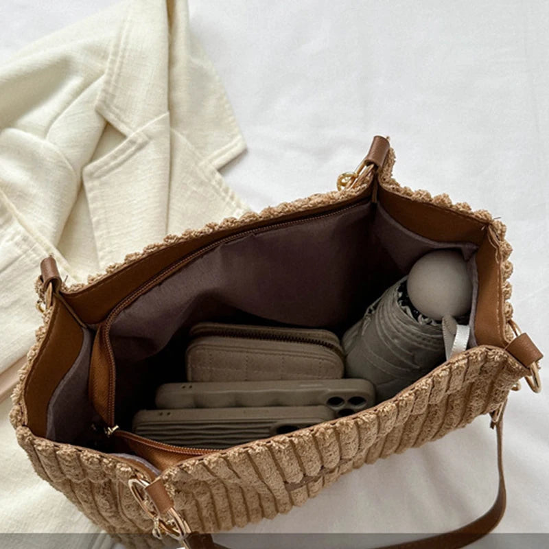 Unzipped corduroy tote bag interior with side pockets and brown lining