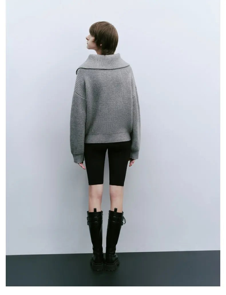 Gray knit half-zip sweater back view with ribbed collar and long sleeves