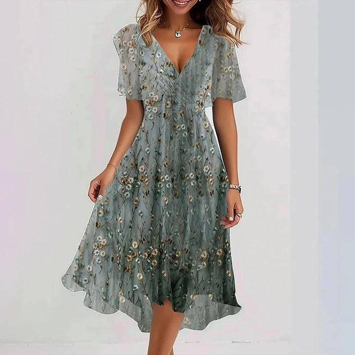 Green floral midi dress with V-neck and short flutter sleeves