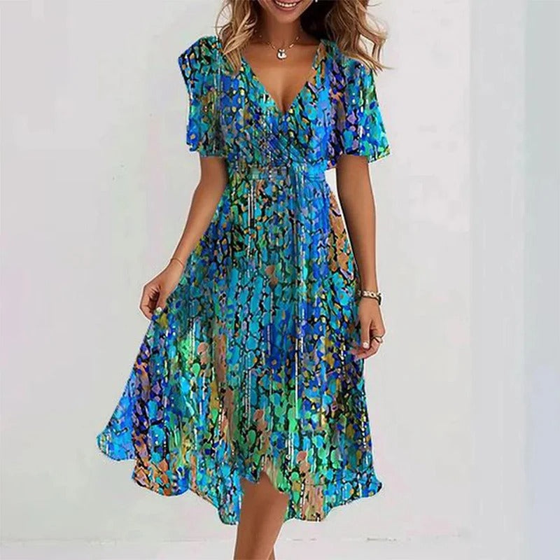 Teal and blue abstract print midi dress with V-neck and short puff sleeves