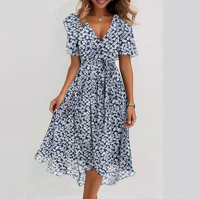 Navy and white daisy print midi dress with V-neck and short puff sleeves