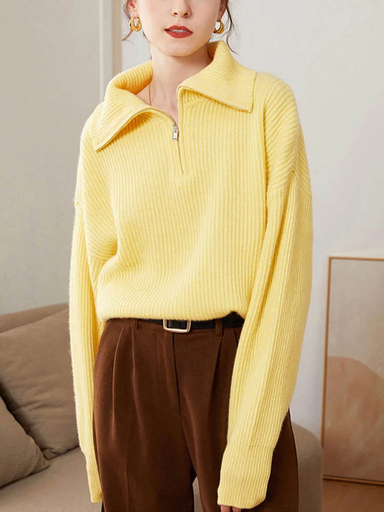 Yellow half-zip ribbed knit sweater with collared zipper and long sleeves