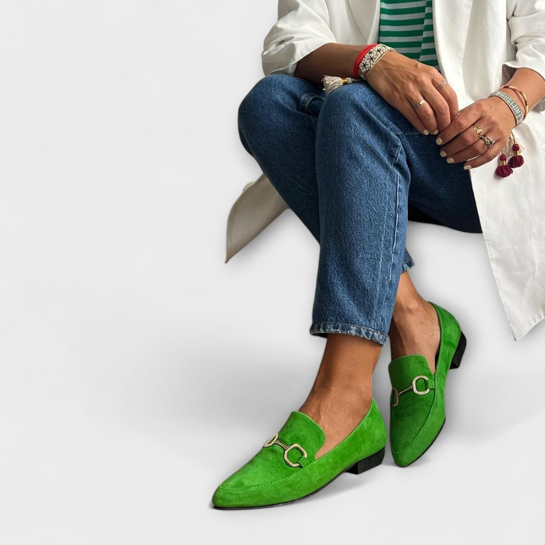 Pointed green ballet flats with gold-tone buckle detail, low profile heel