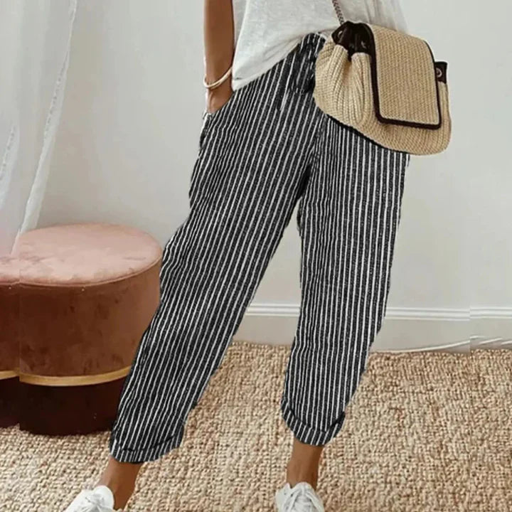 Black and white striped retro pants with relaxed fit and ankle length