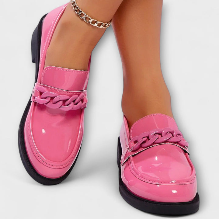 Merry round-toe casual loafers in glossy pink patent, braided chain ornament, low block heel