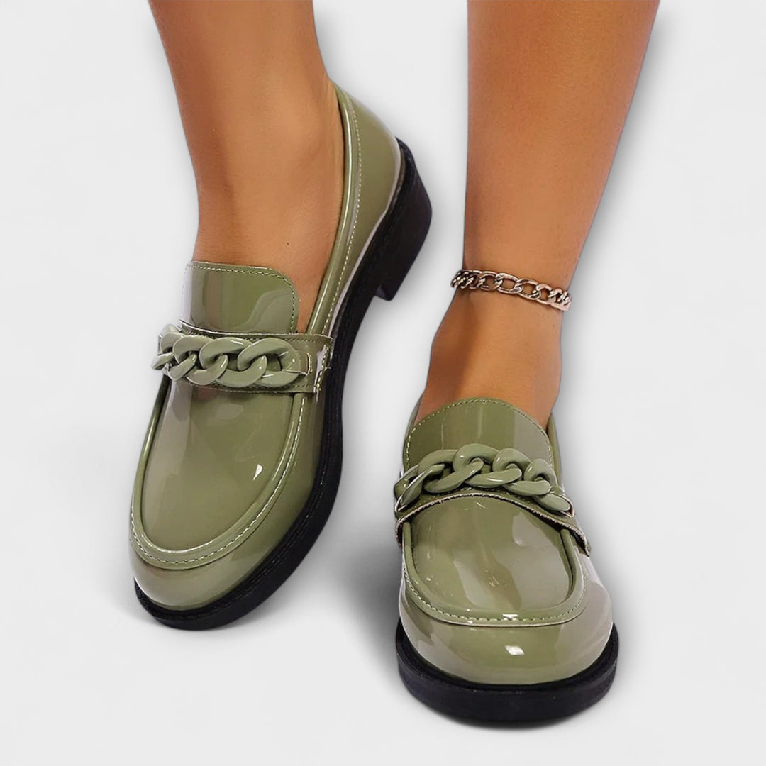 Merry round-toe casual loafers in glossy green patent, braided chain detail, low block heel