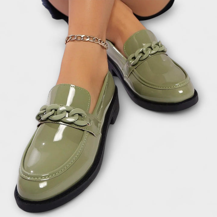 Merry round-toe casual loafers, glossy green patent with braided chain ornament detail