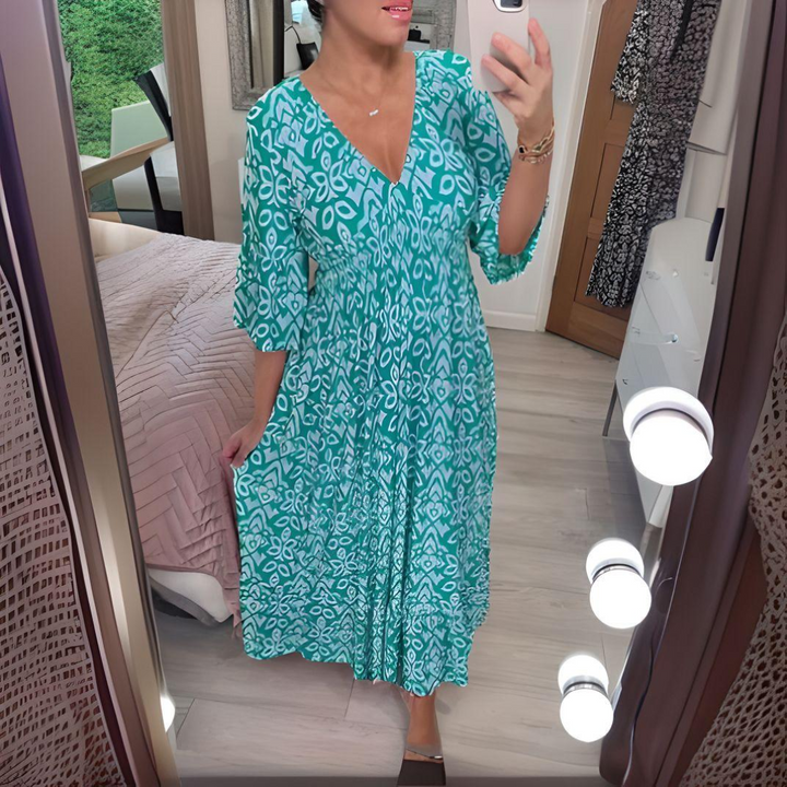 Aqua blue boho printed dress with V-neck and three-quarter flared sleeves, midi tiered skirt