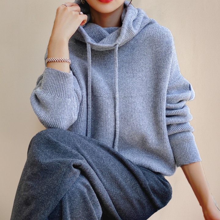 Light blue winter hoodie with hood and drawstring ties, ribbed cuffs and hem