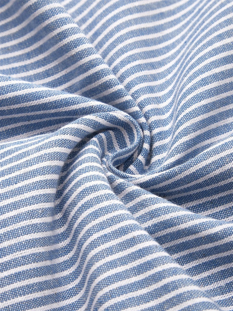 Blue striped fabric close-up with thin white lines and textured weave