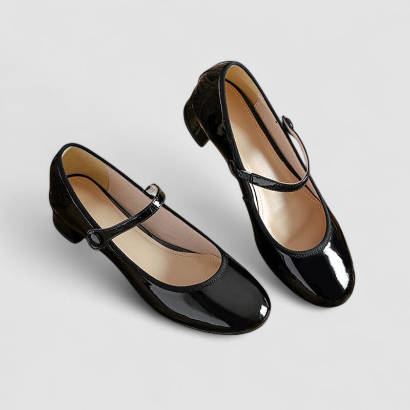 Black Mary Jane shoes with ankle strap and glossy rounded toe