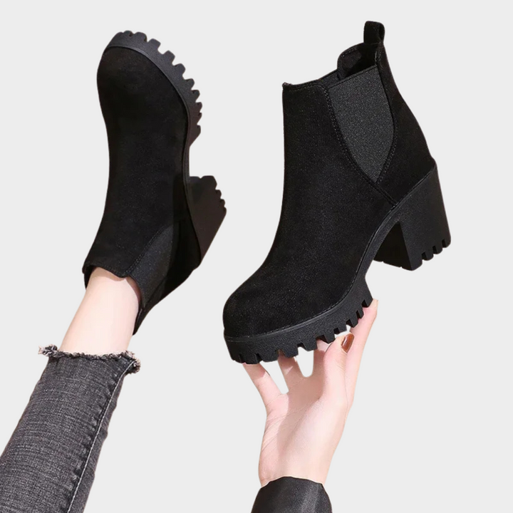Black block-heel short boots, pull-on style with elastic gore and thick lug sole