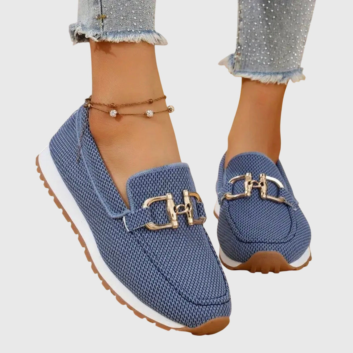 Blue textured loafer sneakers with gold-toned buckle accents