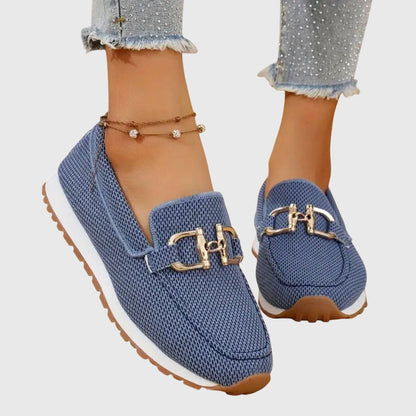 Blue textured loafer sneakers with gold-toned buckle accents