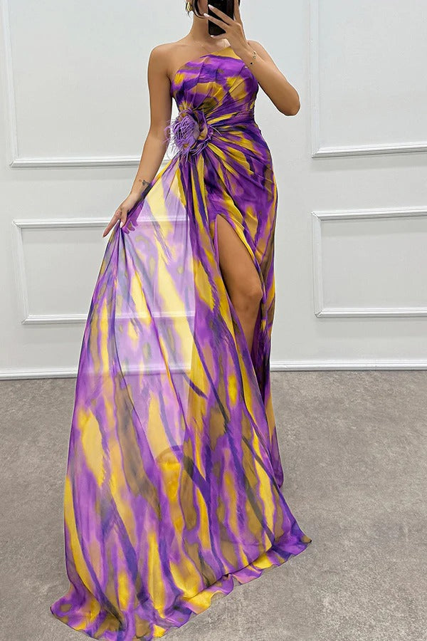 Strapless tie-dye maxi dress with high side slit and flower detail, purple and yellow