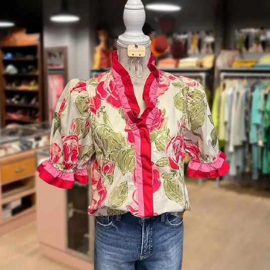 Floral ruffle stripe blouse with red trim, white base, and puff sleeves