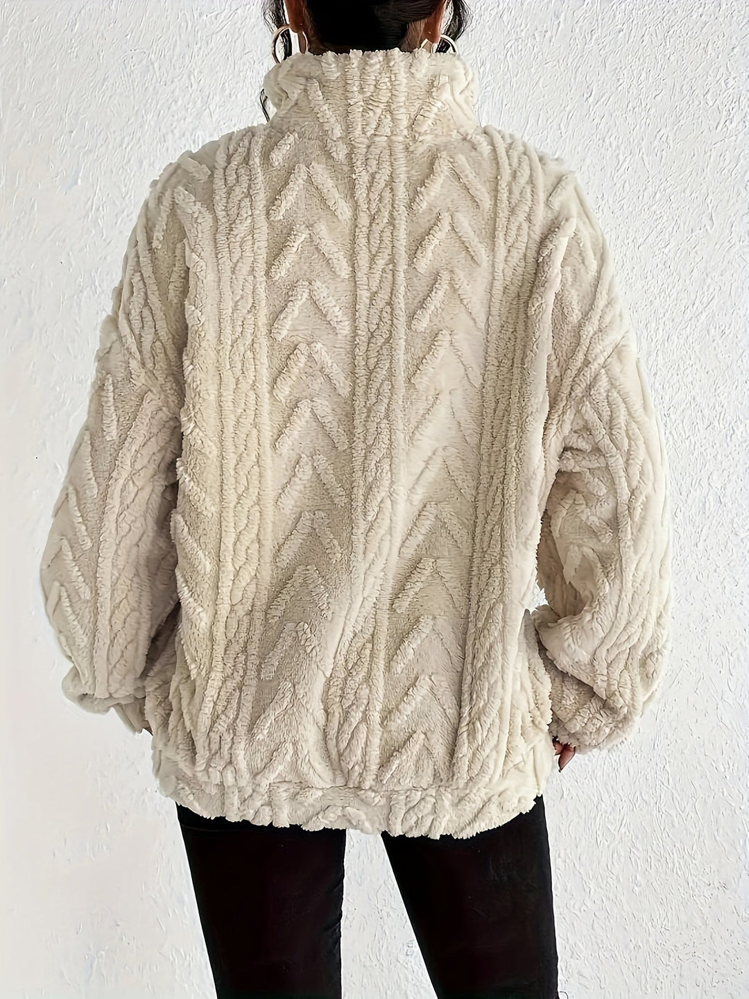 Warm knit quarter-zip sweater in cream, cable texture, long sleeves, back view.