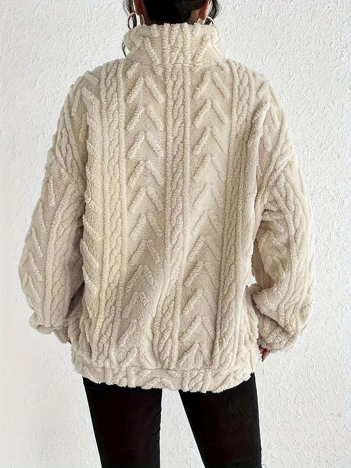 Warm knit quarter-zip sweater in cream, cable texture, long sleeves, back view.