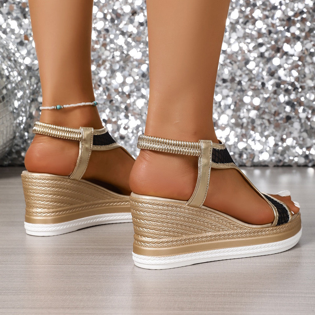 Ergonomic wedge sandals with open toe, gold straps and black mesh side panels