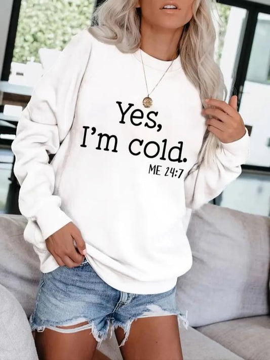White pullover sweatshirt with 'Yes, I'm cold.' ME 24:7 slogan print