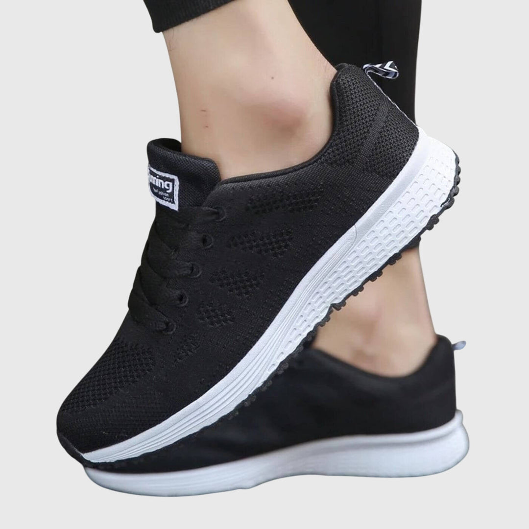 Women's slim sport shoes, black knit with lace-up front and white midsole detail