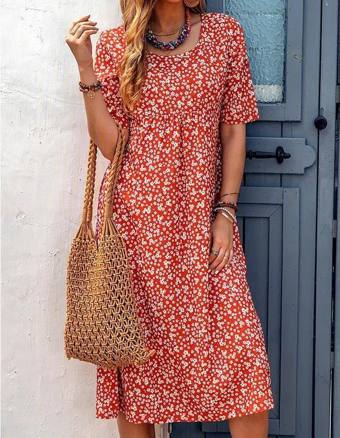 Floral summer dress in red with short sleeves and scoop neckline, midi length