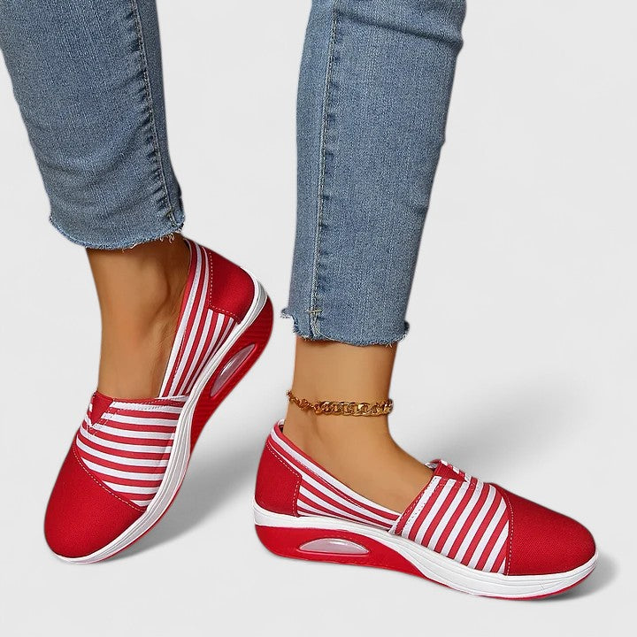 Red striped orthopedic slip-on sneakers with white sole and cushioned footbed