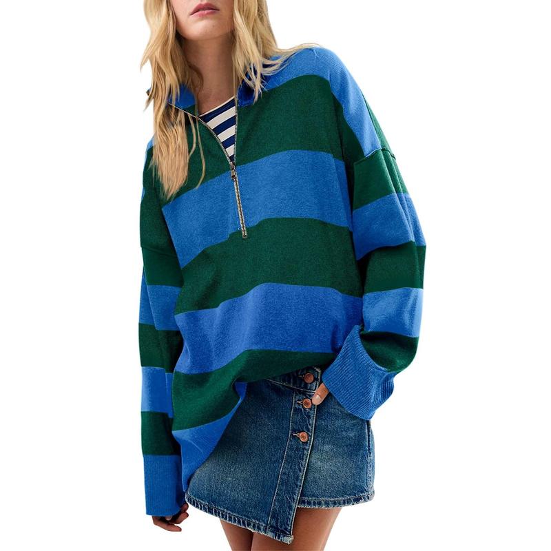 Oversized turtleneck sweater with blue-and-green striped half-zip