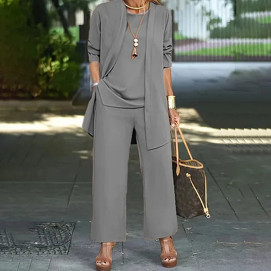 Grey three-piece set with open cardigan over short-sleeve top and wide-leg trousers