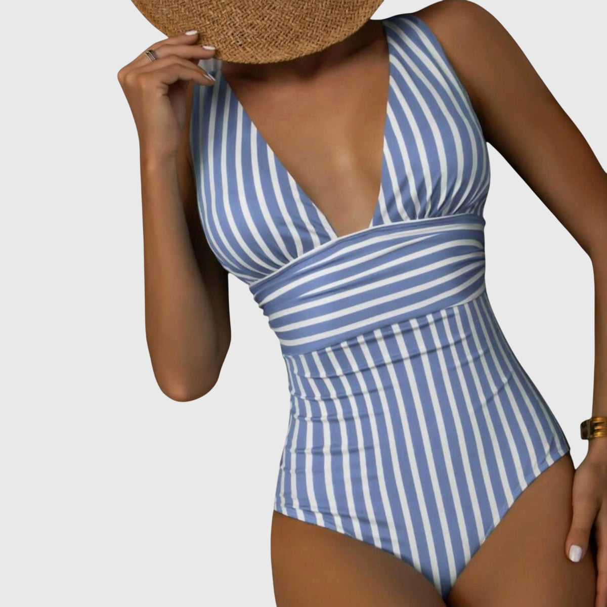 Aurora blue-and-white striped one-piece swimsuit with V-back and halter neckline