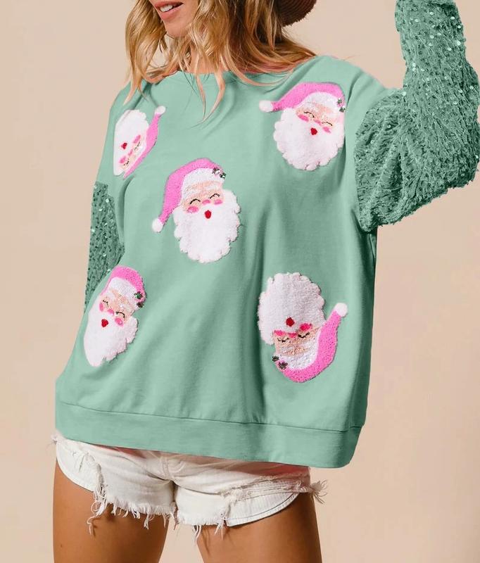 Light green long-sleeve sweater with sequin cuffs and white snowman appliques