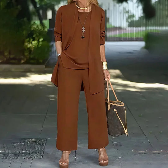 Brown three-piece set with open cardigan over short-sleeve top and wide-leg trousers
