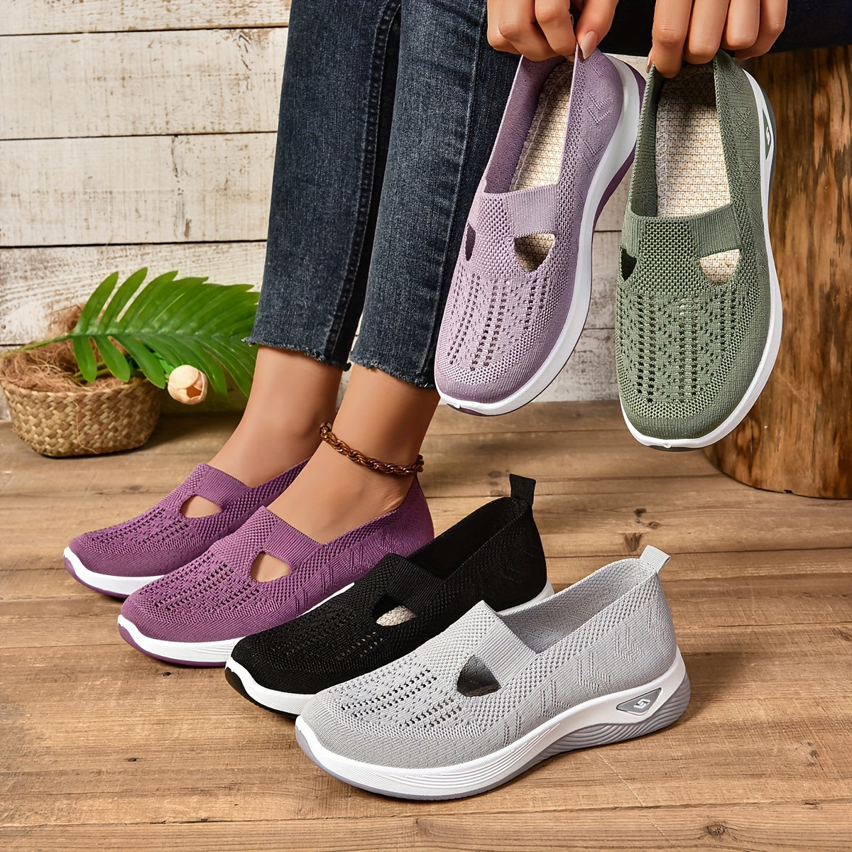 Orthopedic slip-on knit shoes in purple and green, with side cutouts and white soles