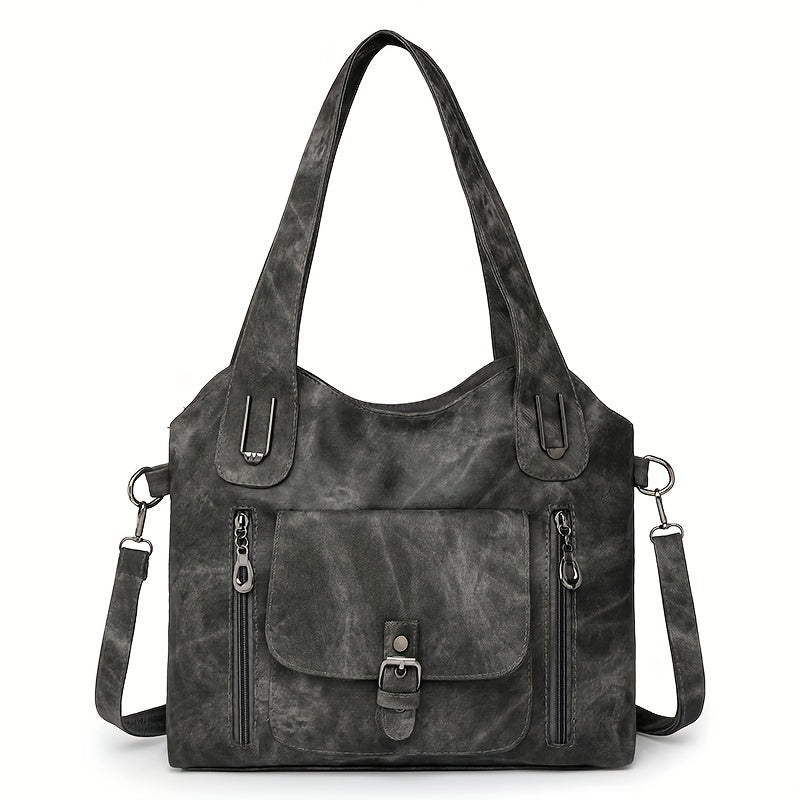 Black suede-look shoulder bag with top handles, front flap pocket, and adjustable shoulder strap