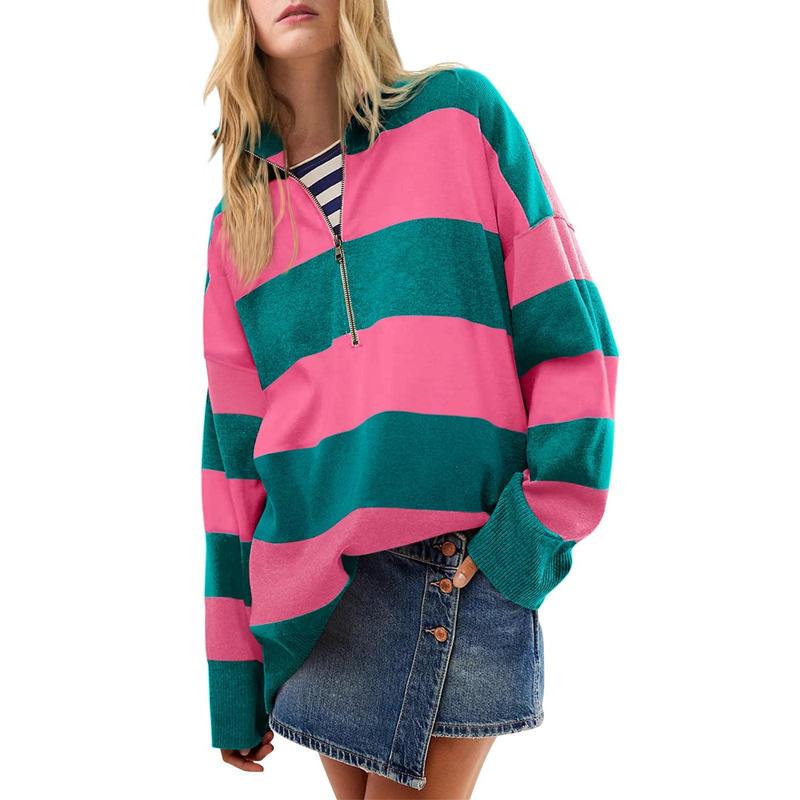 Oversized turtleneck sweater with pink-and-green striped half-zip