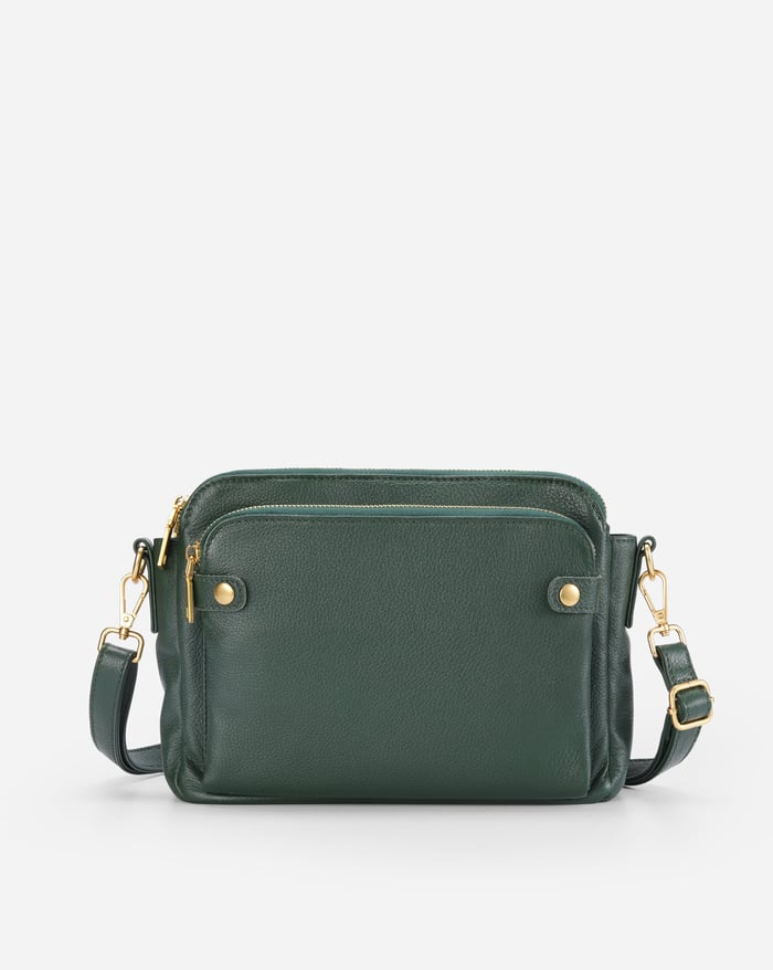 Deep green sleek crossbody bag with zip top, front pockets, and adjustable shoulder strap