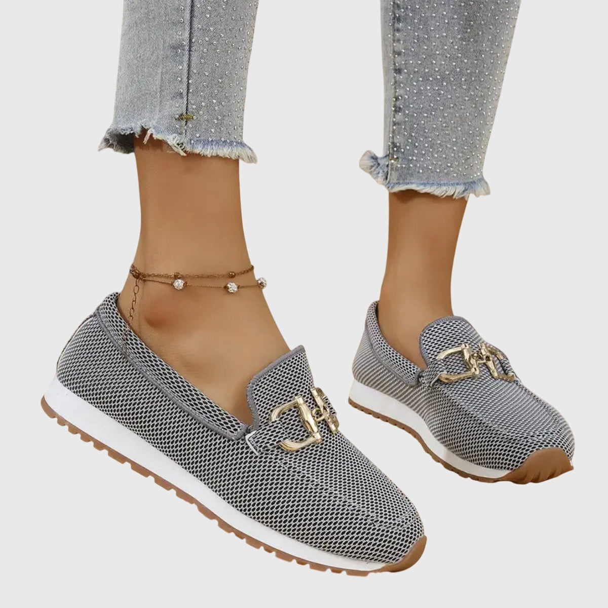 Grey textured loafer sneakers with gold-toned buckle accents