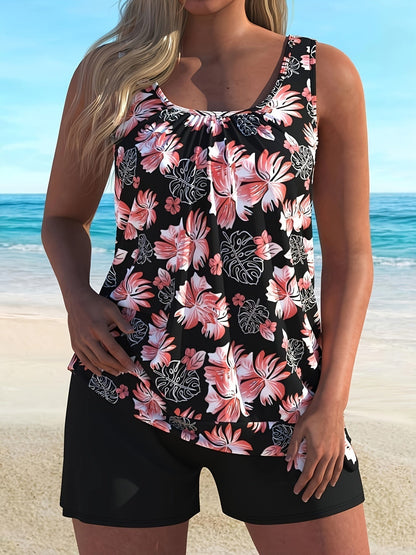 Black floral print tankini top with scoop neckline and matching black swim shorts.