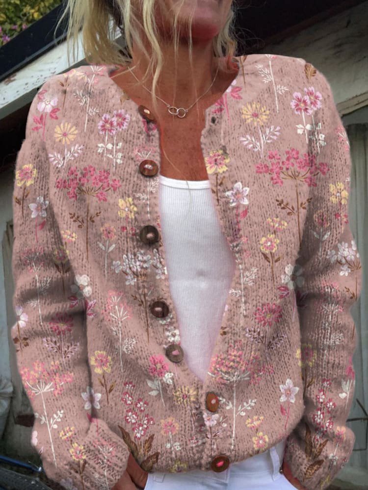 Pink vintage floral cardigan with V-neck and button front, long sleeves