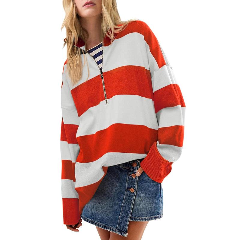 Oversized turtleneck sweater with red-and-white striped half-zip