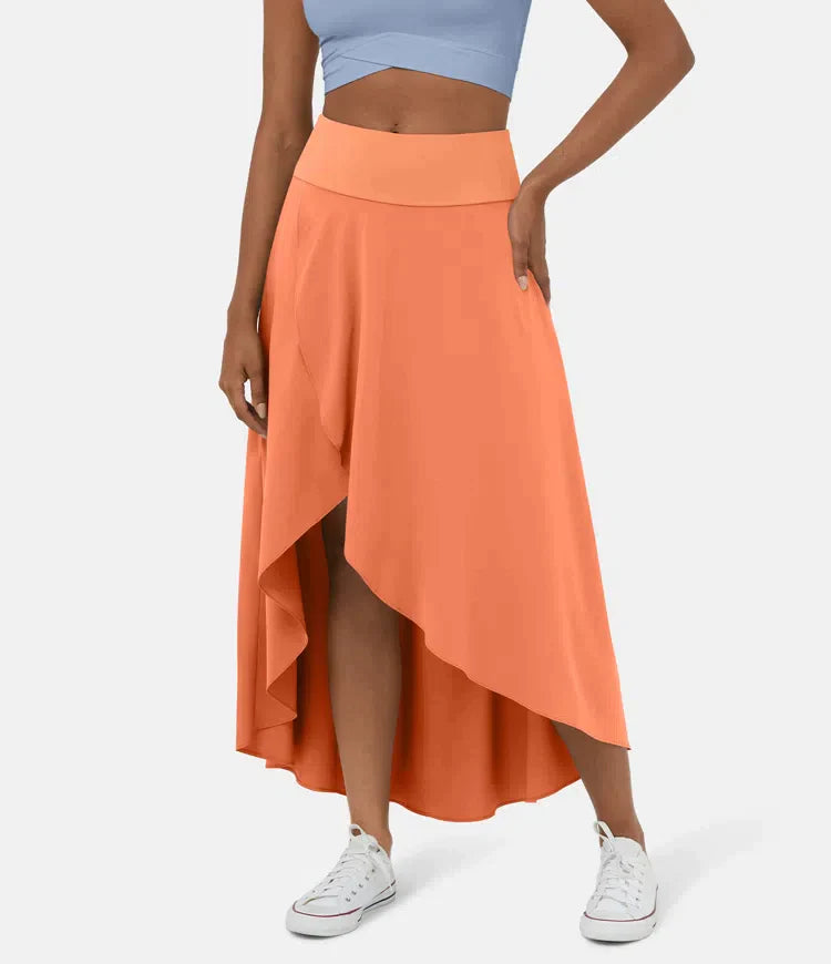 AMELIE asymmetric midi skirt in bright orange with high waist and layered high-low hem