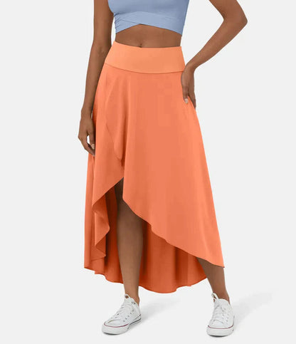 AMELIE asymmetric midi skirt in bright orange with high waist and layered high-low hem