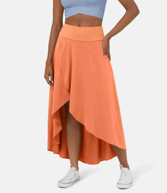 AMELIE asymmetric midi skirt in bright orange with high waist and layered high-low hem